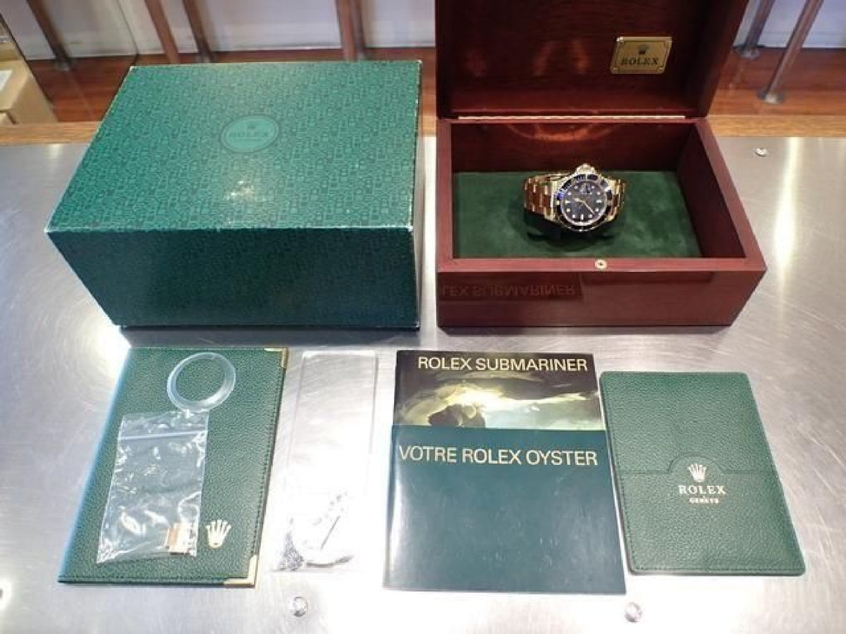 ROLEX Submariner date 18KYG cadran bleu série Y Homme 193904225 hannari-shop