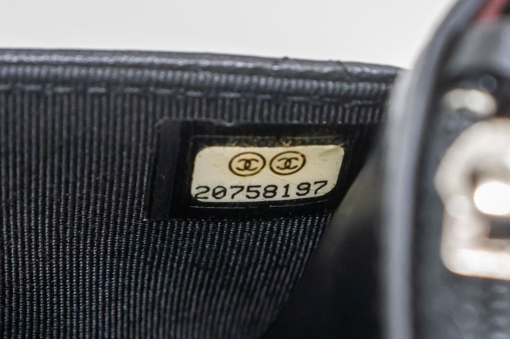 Sac à bandoulière CHANEL Black Classic Wallet On Chain WOC en agneau ab8 hannari-shop